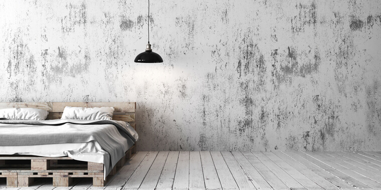 A loft style bedroom with recycled pallet bed. White eco design scheme is bright and minimalistic. 3D render.