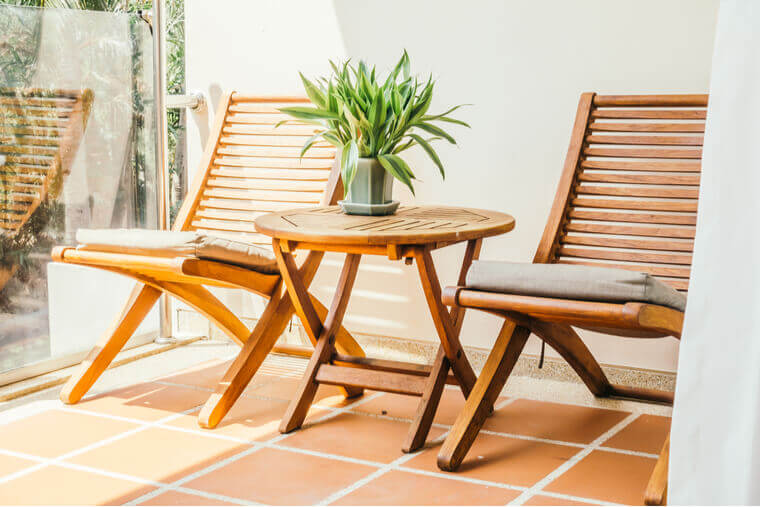 Empty chair and table around outdoor deck