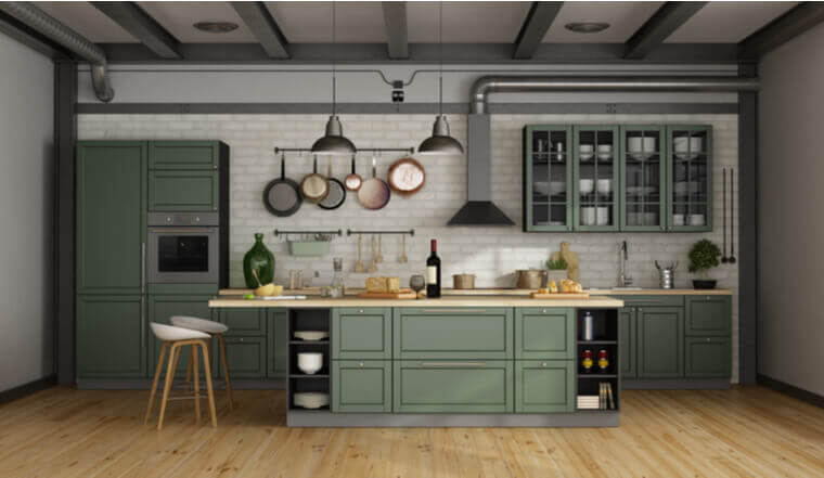 Vintage green kitchen with island in a loft