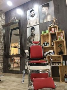 A red recliner barbershop chair