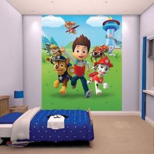 A kid's room with Paw Patrol wallpaper