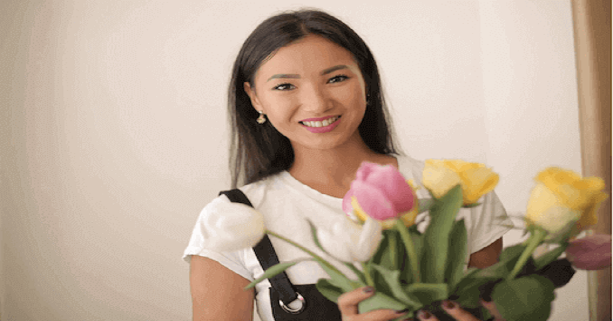A woman holding flowers A woman holding flowers