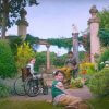 screencap from The Secret Garden film where the three kids are in the secret garden