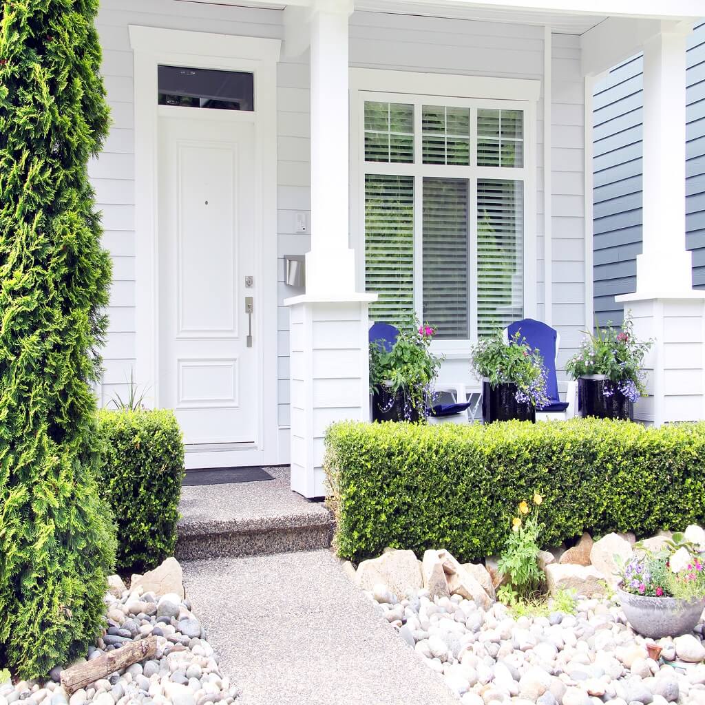 Simple Front Yard Design With White Rocks