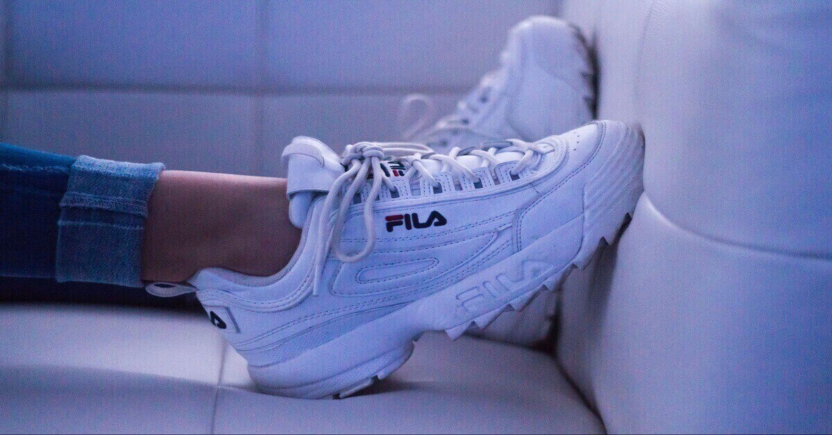 Image of a pair of clean white trainer Image of a pair of clean white trainer