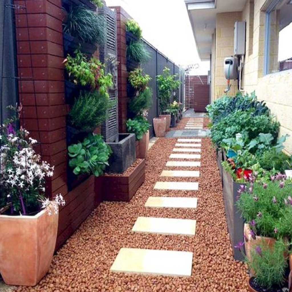 Pebble and potted plant and flowers Pebble and potted plant and flowers