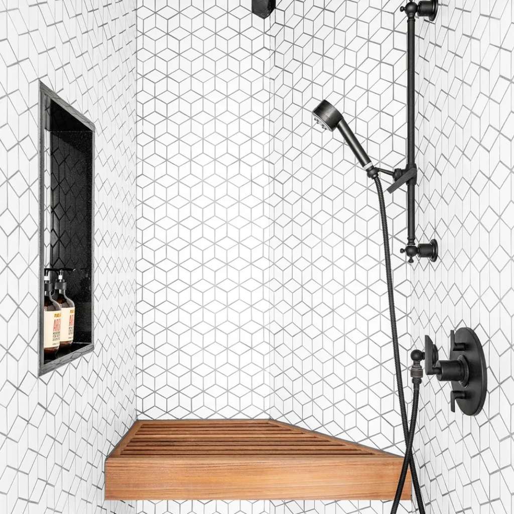 A bathroom with a carved section as storage space A bathroom with a carved section as storage space