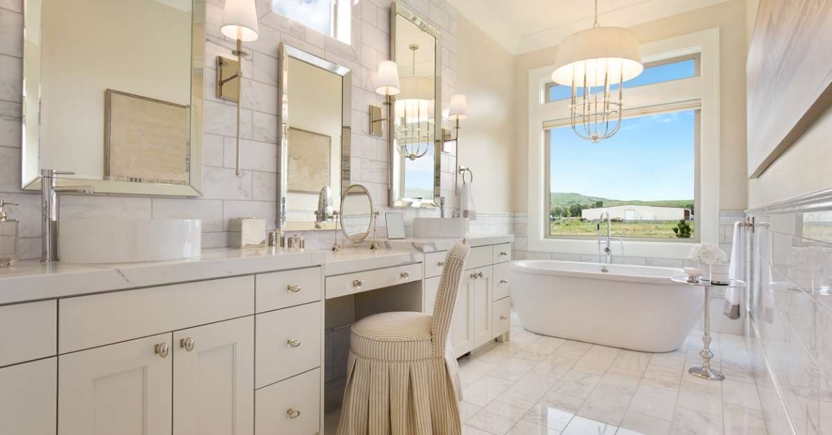 A glamorous bathroom with vessel sink vanities