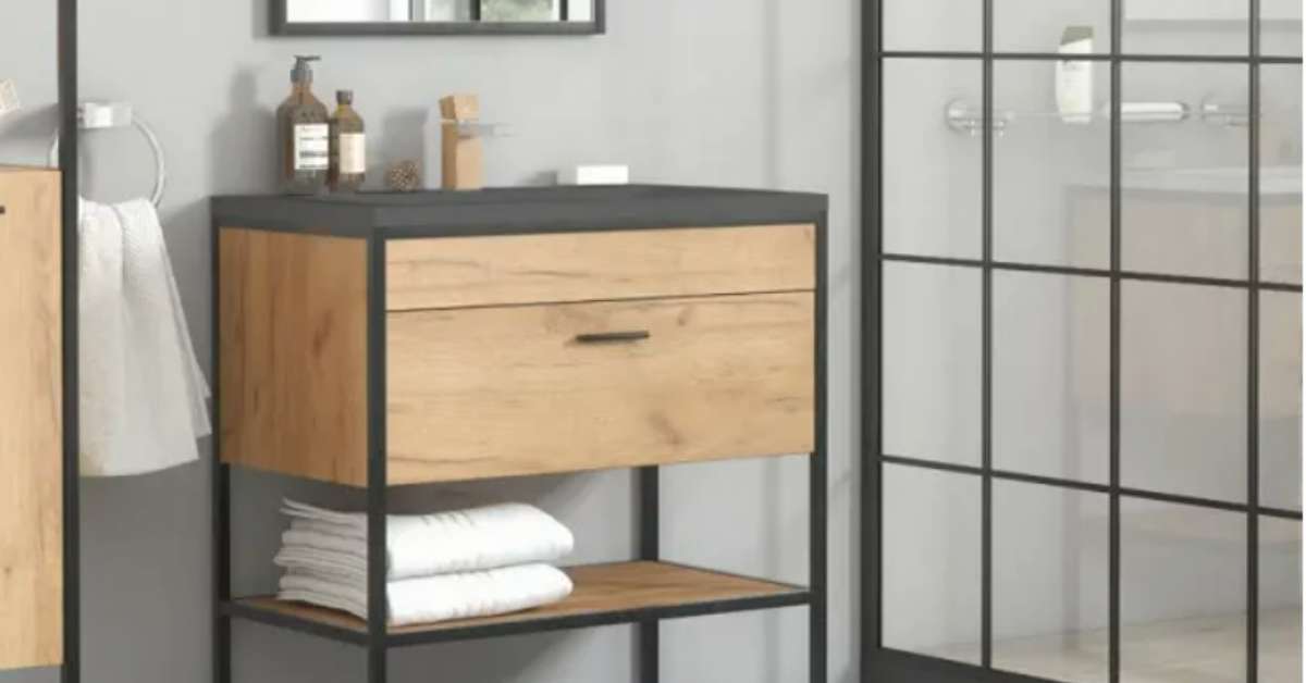 A gray bathroom with a wooden vanity