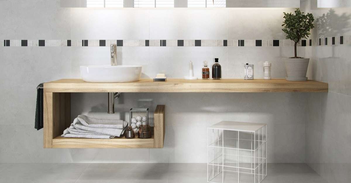 A simple modern bathroom with a floating counter