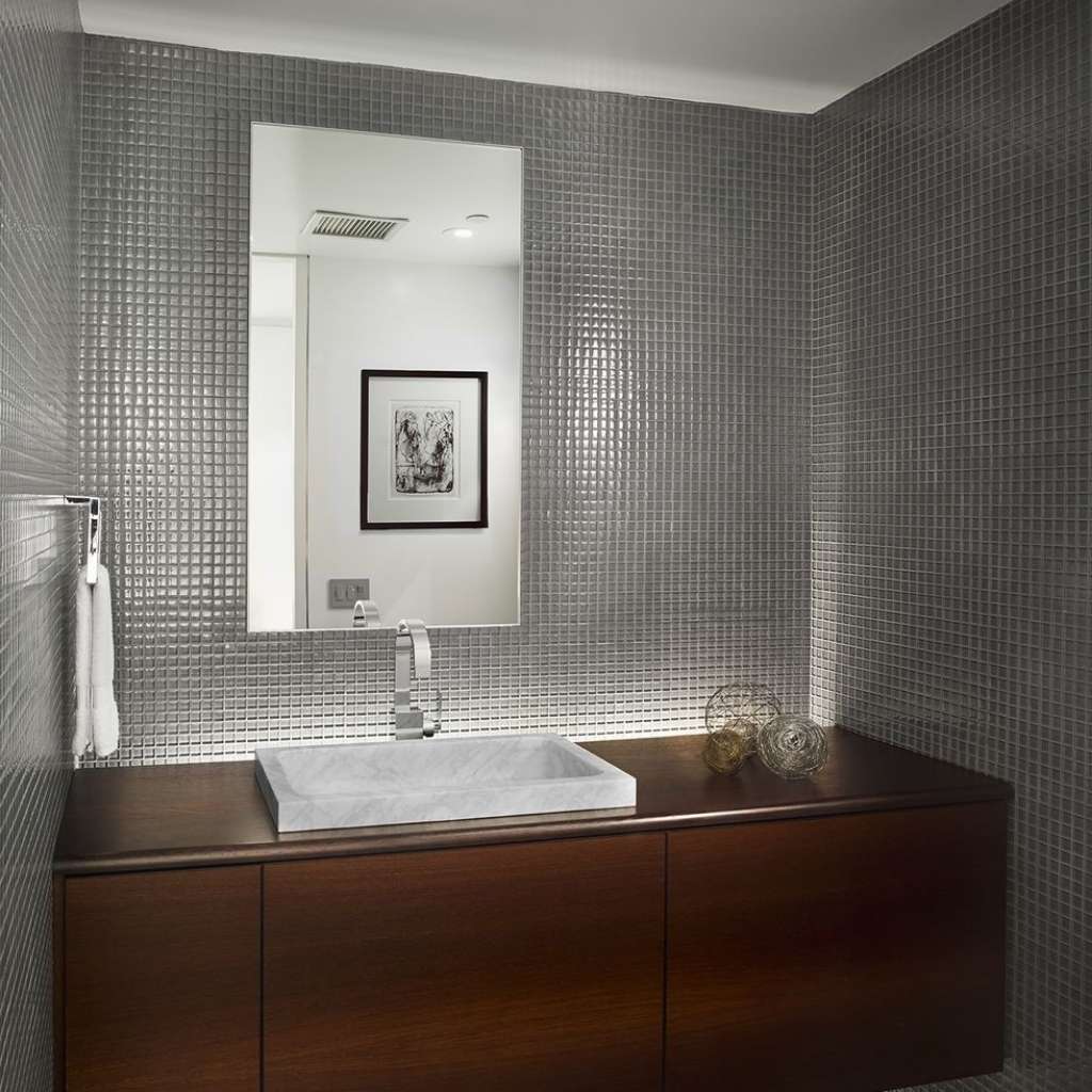 A simple yet elegant floating vanity in a small bathroom A simple yet elegant floating vanity in a small bathroom