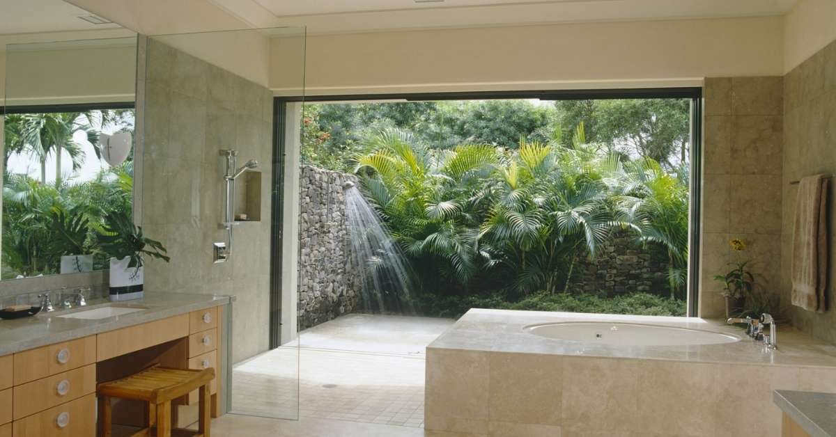 A tropical-themed luxury bathroom
