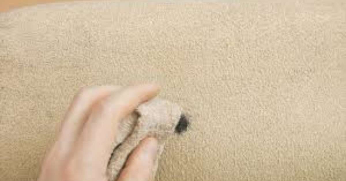 A man removing: Image showing how to remove ink stains from suede couch A man removing: Image showing how to remove ink stains from suede couch