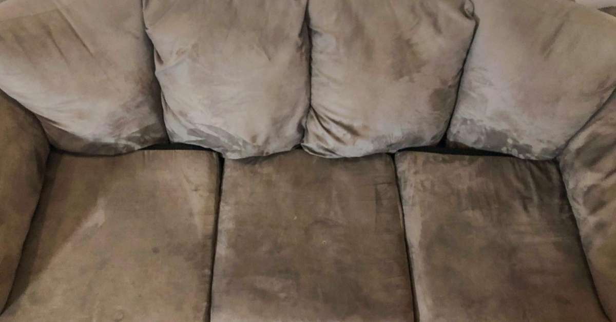 image showing dirty suede couch