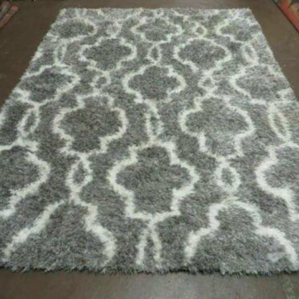 An acrylic shag rug