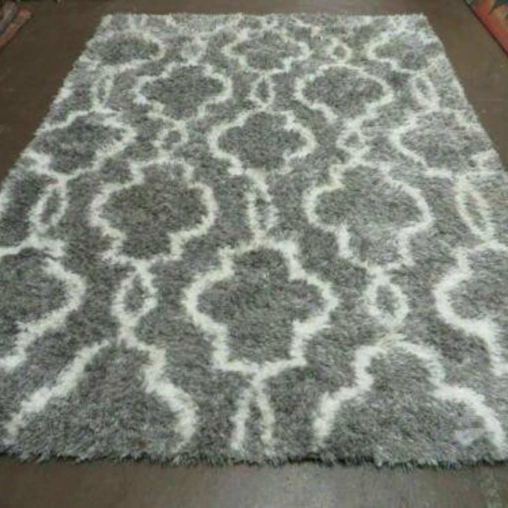 An acrylic shag rug An acrylic shag rug