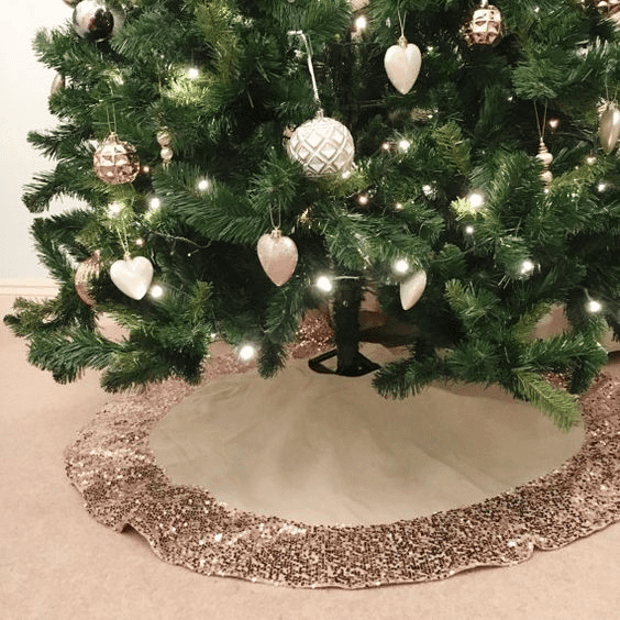 A glittered Christmas tree skirt