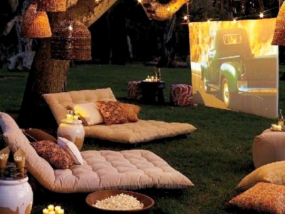 A well-decorated backyard movie night for outdoor entertaining