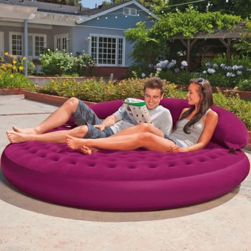 Outdoor and inflatable lounge chair for a backyard movie night