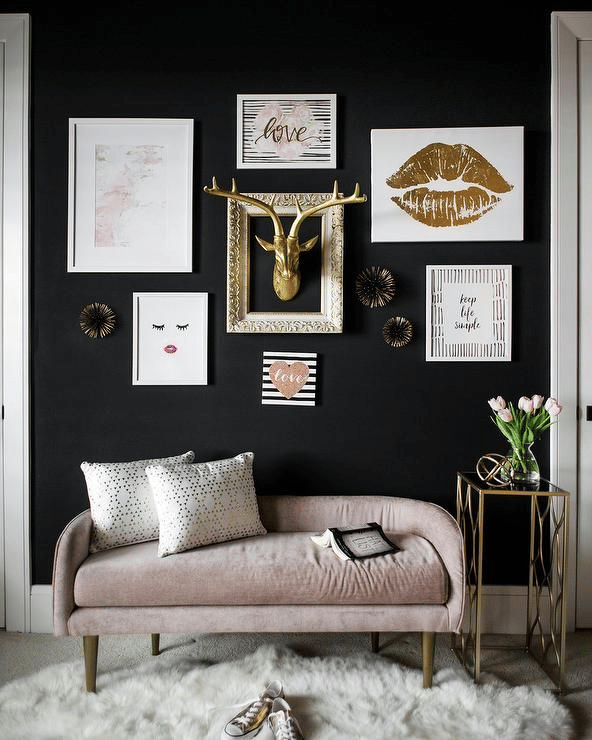 A black room with pink and gold accents A black room with pink and gold accents