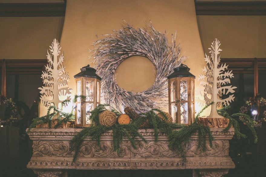 Fireplace MAntel decorated with christmas garland Fireplace MAntel decorated with christmas garland