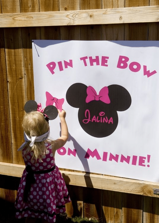 Minnie-mouse-themed birthday party game “Pin the Bow on Minnie”
