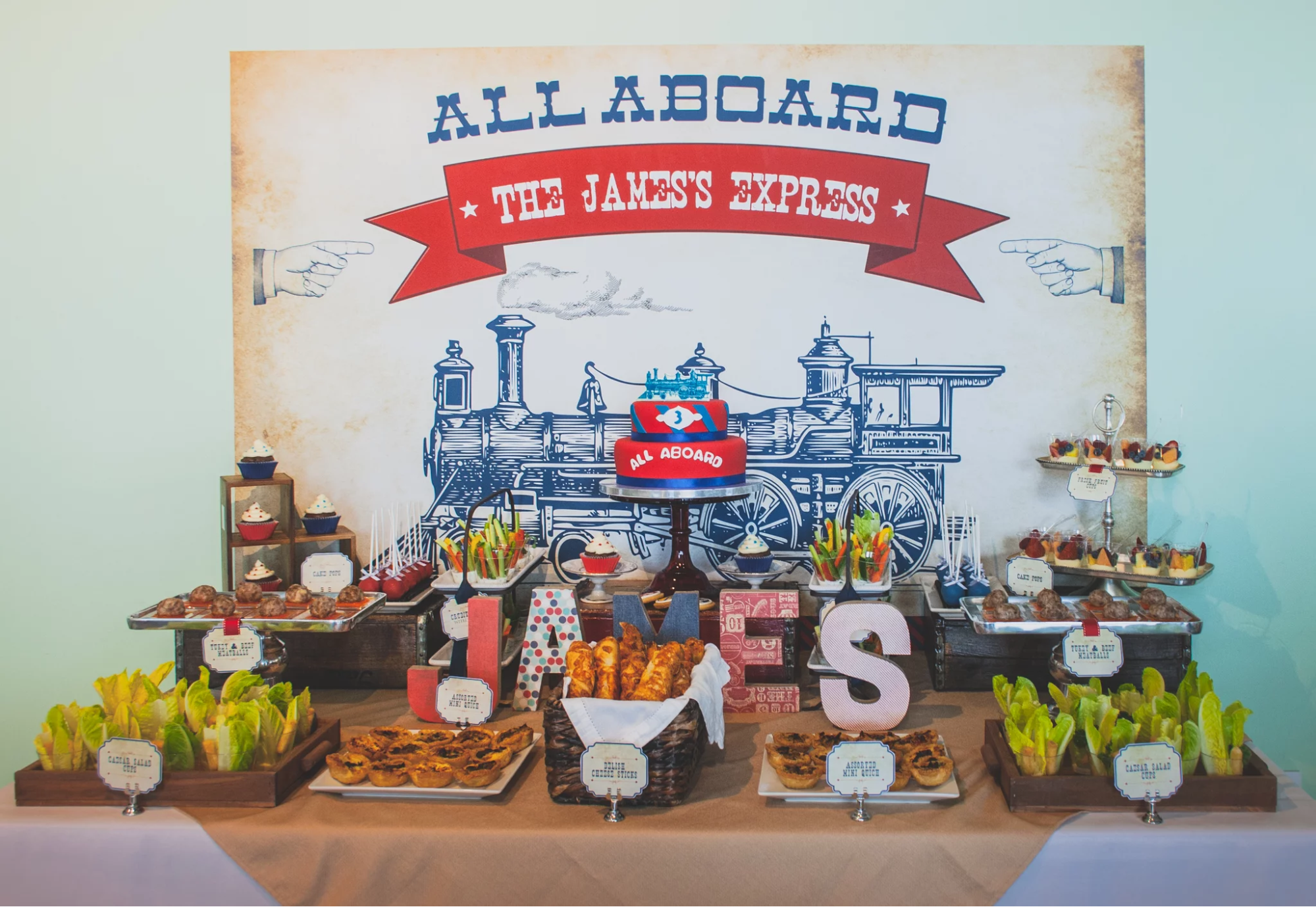 A vintage train-themed birthday party idea for a 3-year old