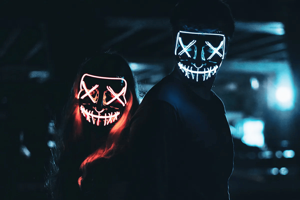 Halloween-themed photoshoot for a couple in creative scary costumes