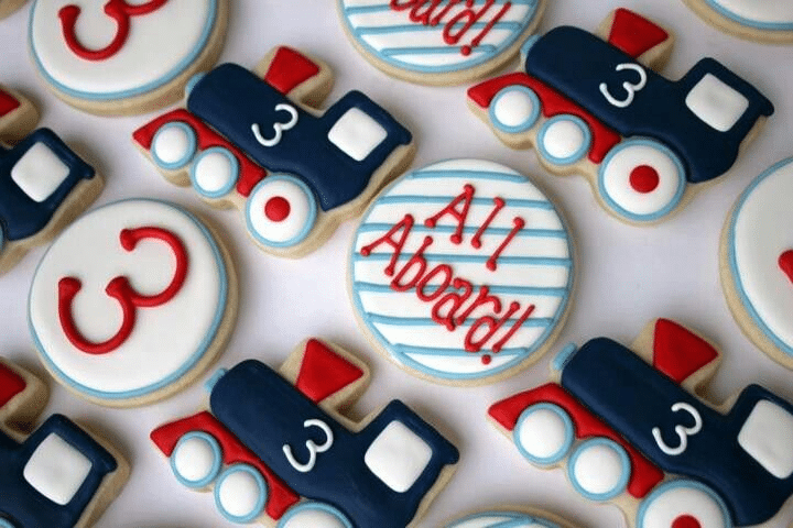 A vintage train-themed birthday party cookies