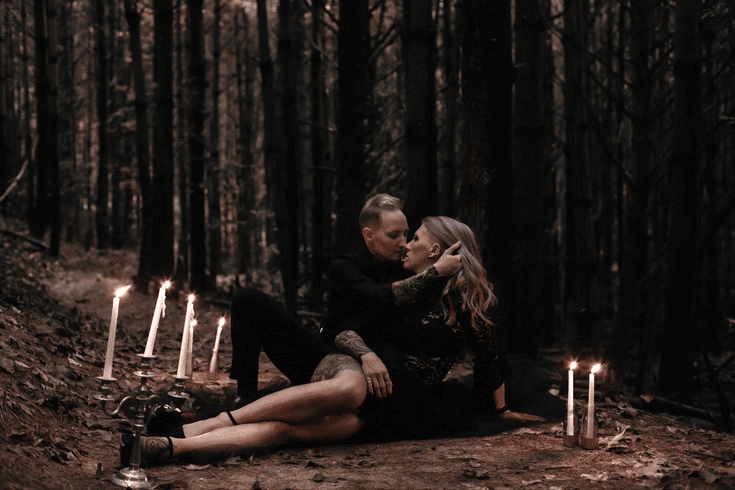 Halloween-themed photoshoot for a couple in a vampire get-up