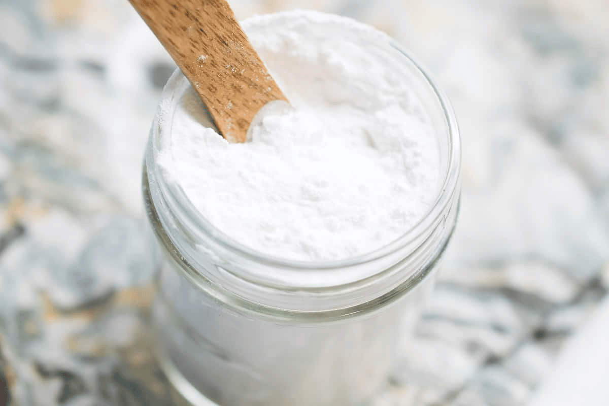 A jar of baking powder A jar of baking powder